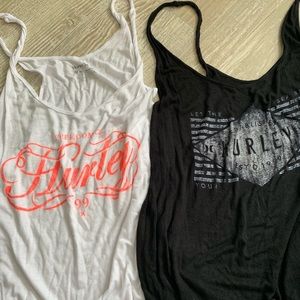 Two women’s medium Hurly tank tops